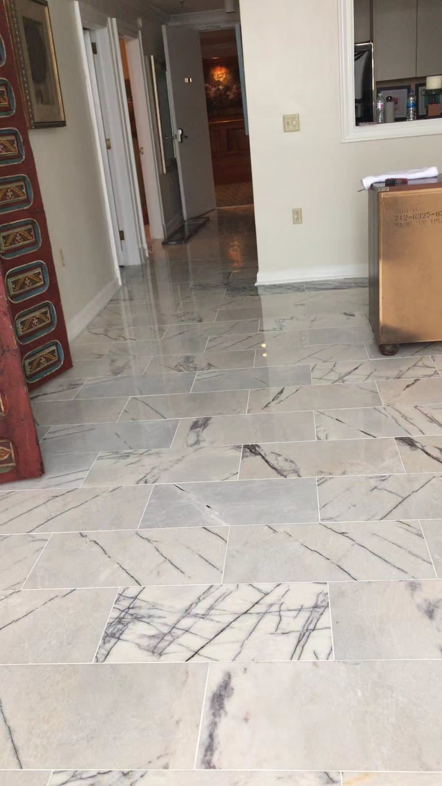 Marble hallway, cuts aligned to the doorways