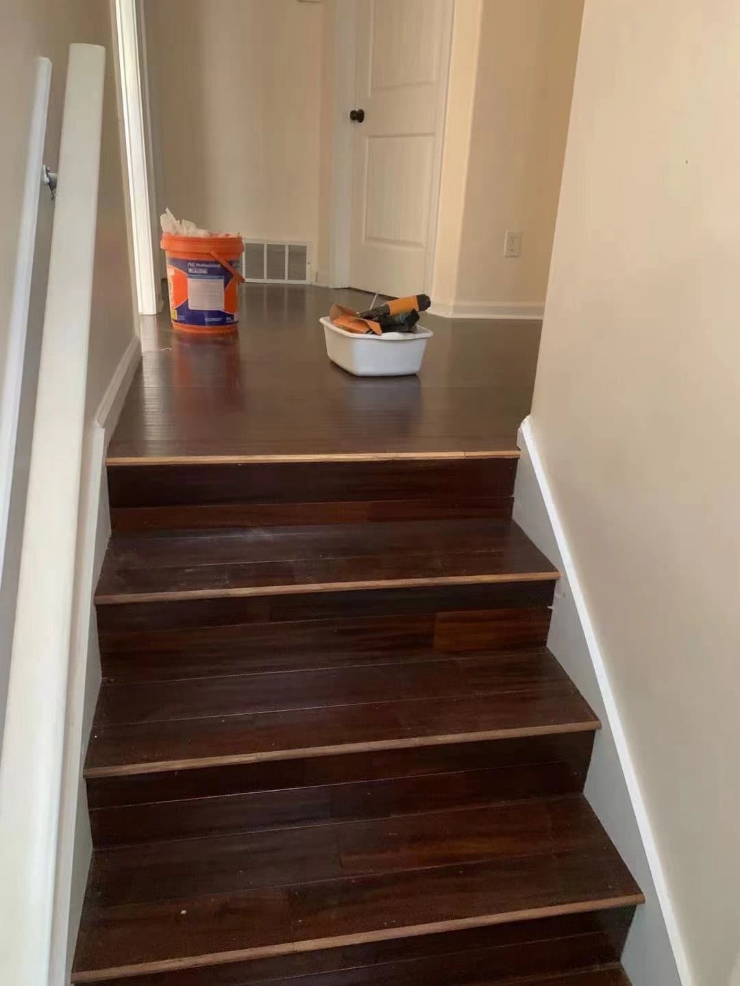 Landing and treads wrapped in matching hardwood